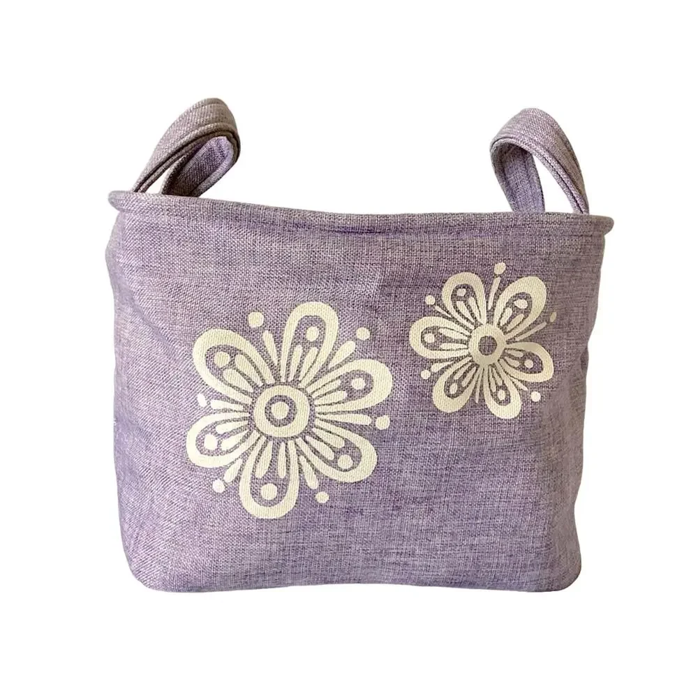 Lavender cloth basket with floral accents